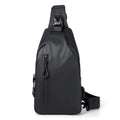 Black sling crossbody backpack for men with zip closure and soft handle, solid colour