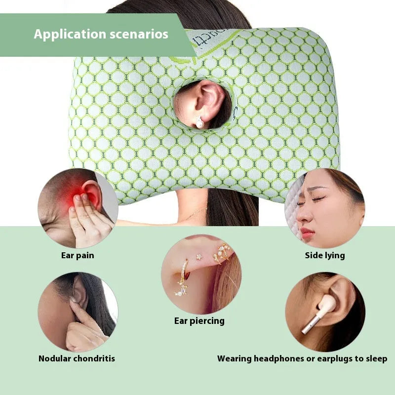 Beauty salon single hole ear pillow in grey on a treatment bed.
