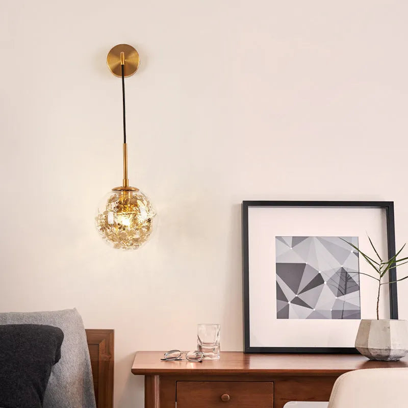Modern glass wall lamp with LED light in gold or silver finish, shown in 15cm and 20cm sizes.