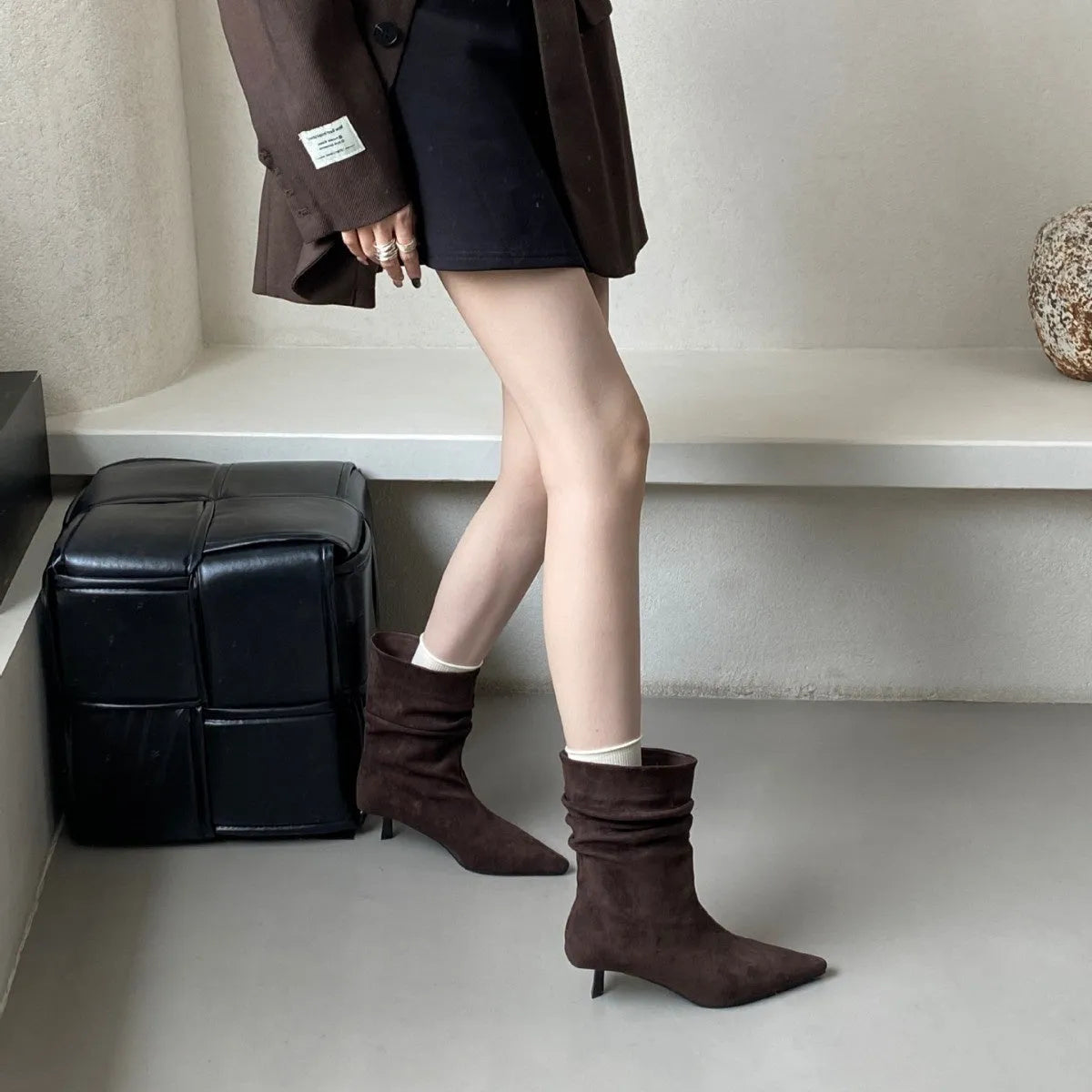 Women's pointed toe mid-calf boots with low stiletto heel, black microfiber upper, slip-on style