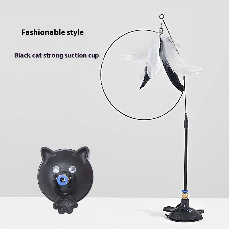 Interactive cat teaser toy with suction cup base, long handle, and dangling brush with bell attachment