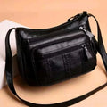 Black soft PU leather messenger bag with retro stitching and single shoulder strap
