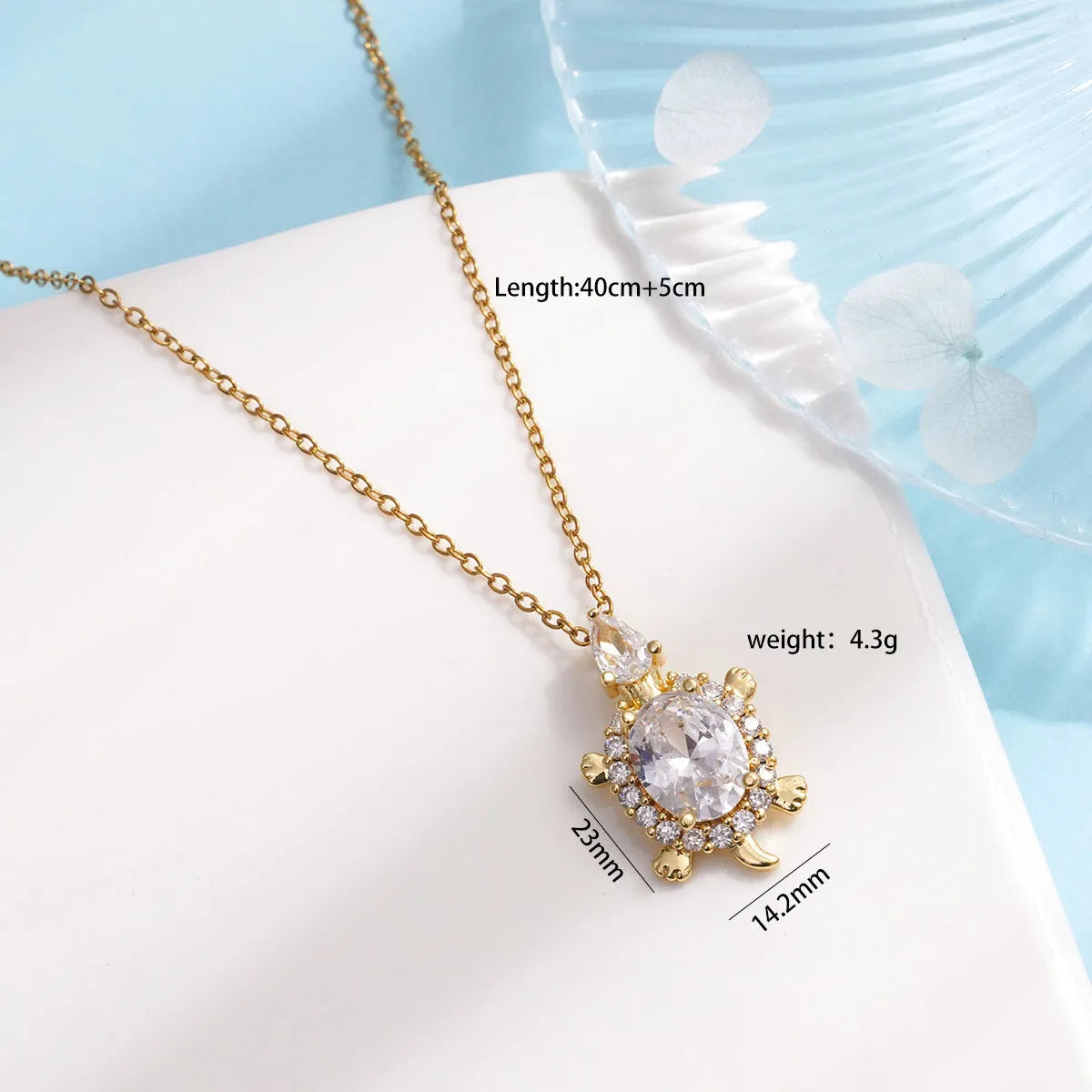 Gold-plated copper sea turtle necklace with zirconium accents and mixed gemstone inlay, O-link chain, light luxury style for women