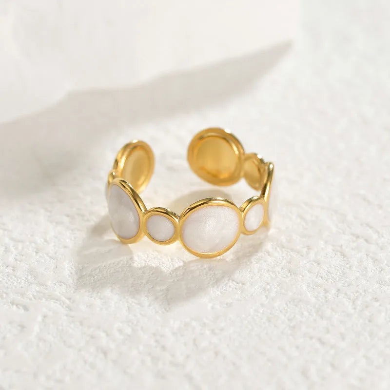 Geometric angular ring with adjustable opening in electroplated stainless steel