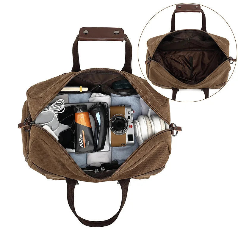 Canvas crossbody travel bag in black with sewing line detailing showing 36-55 litre capacity