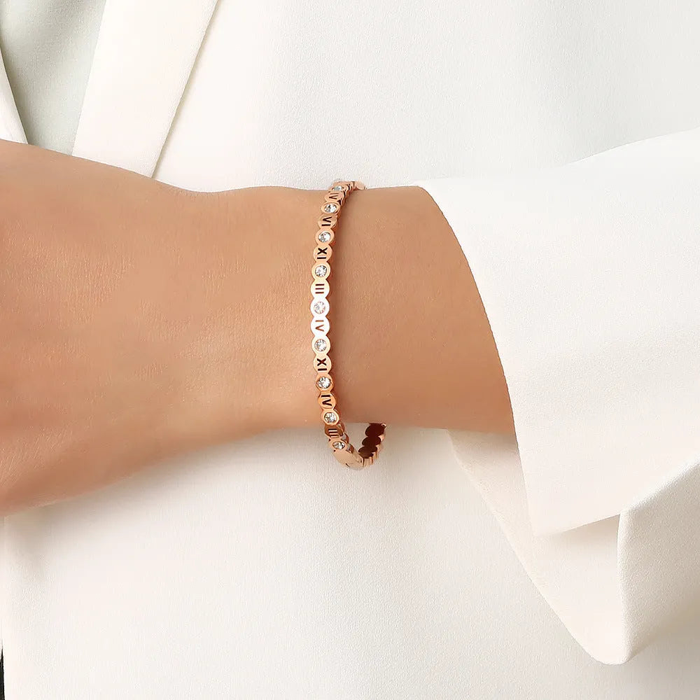 Korean style titanium steel bracelet with numeric elements in gold, rose gold, and steel colour options