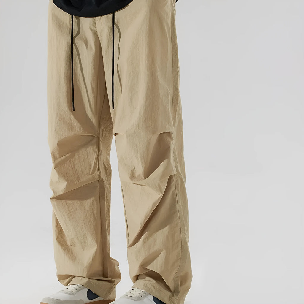 Men's loose straight-leg casual trousers in thin ice silk nylon fabric available in multiple colours
