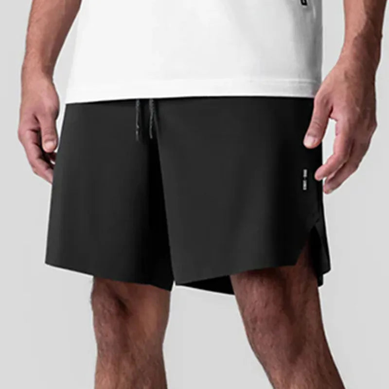 Men's grey seamless sports shorts with knee length and straight cut design for athletic activities