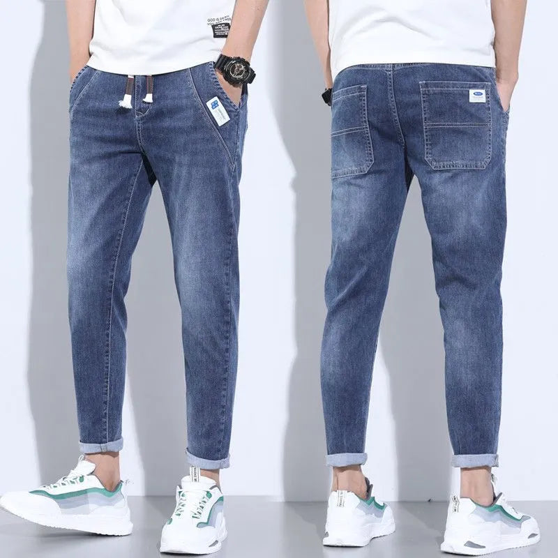 Men's denim stretch casual trousers in dark blue, cropped length, horn leg opening, size 5XL