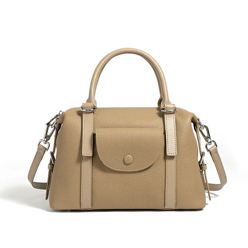 Genuine leather street trend ladies handbag with lock detail in black, brown, or elephant grey