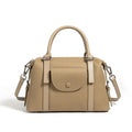 Genuine leather street trend ladies handbag with lock detail in black, brown, or elephant grey