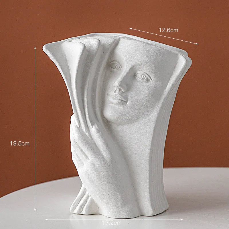 Ceramic book stand with glazed finish in modern simple design supporting books on desk