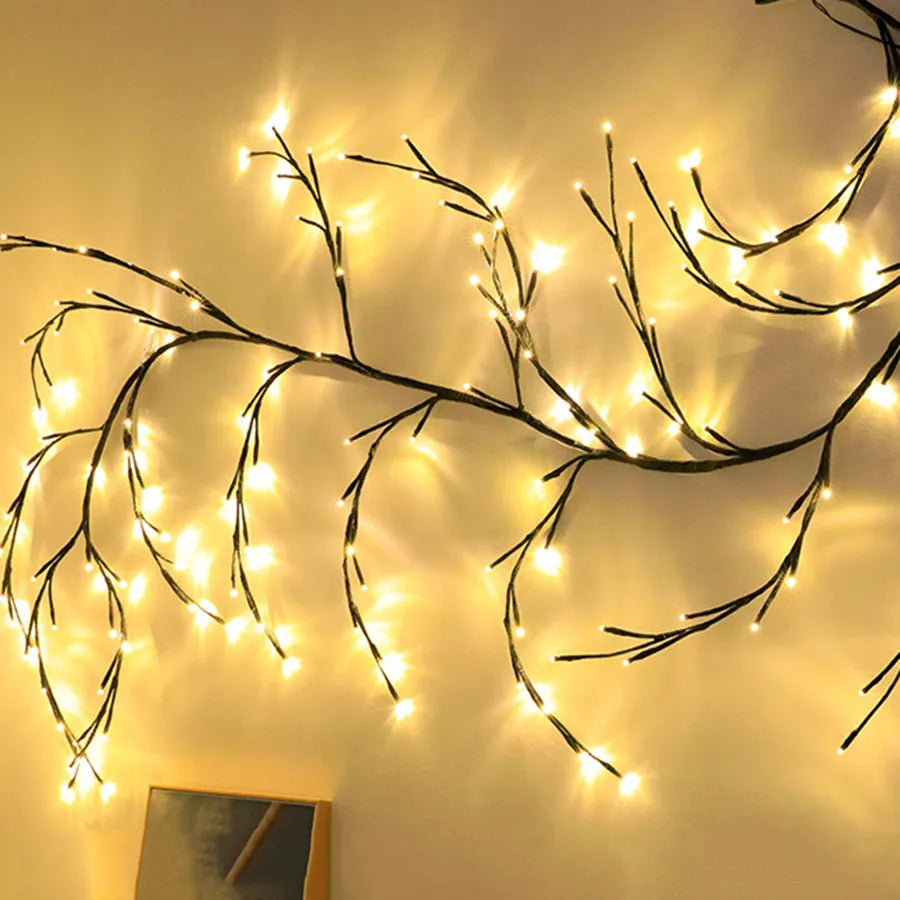 Flexible birch texture LED vine light garland with warm white lights draped along wall