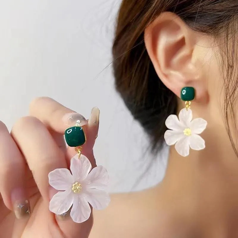 Dark green alloy stud earrings with needle flowers design for women