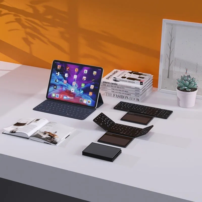 Black B055 Bluetooth folding keyboard with large touchpad and Type-C, folded and unfolded views