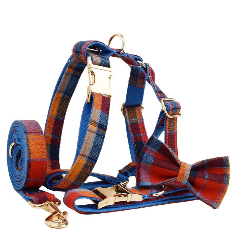 Four-piece dog accessory set with collar, leash, bow tie, and vest in cloth material