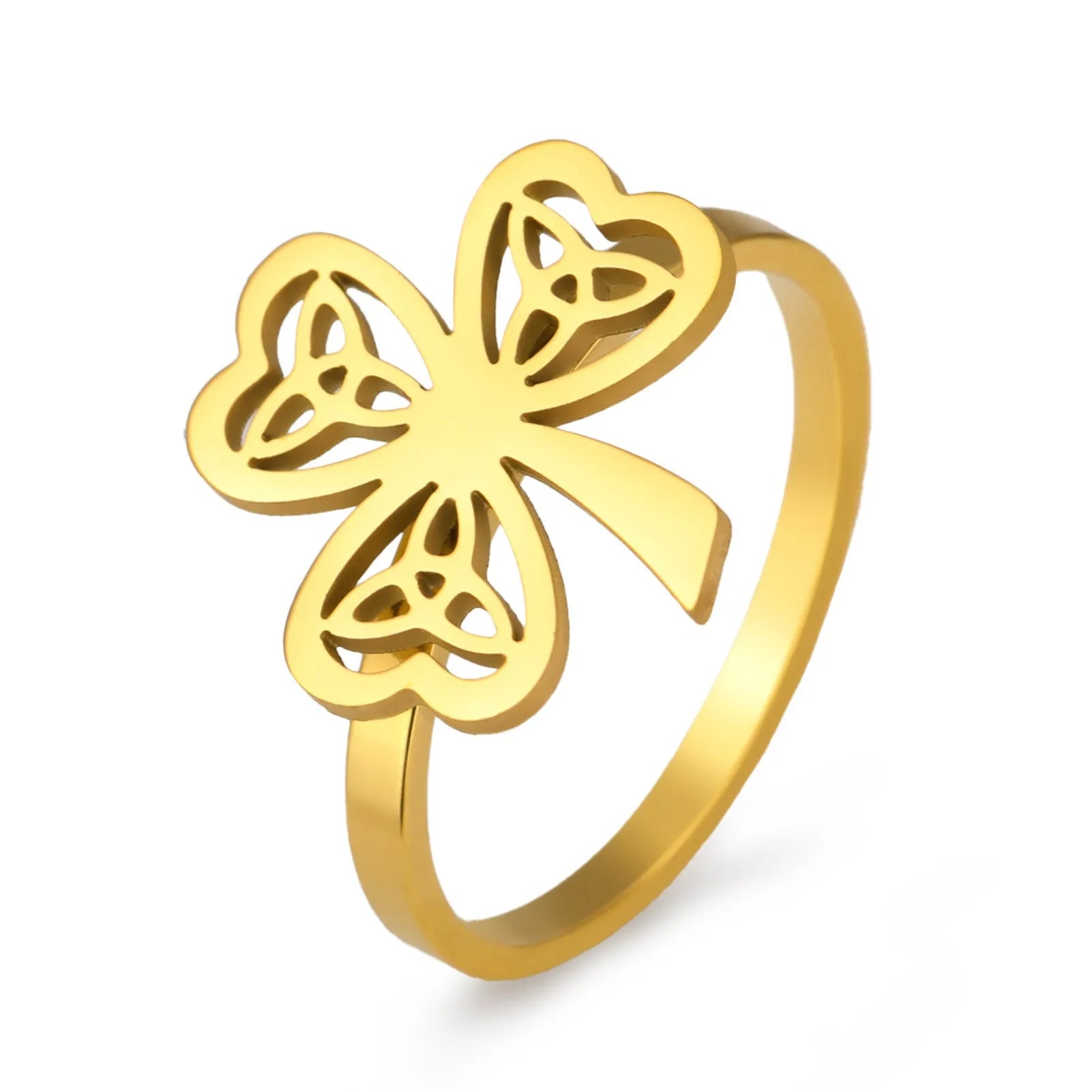 Women's stainless steel lucky hollow ring in gold colour on a hand, showing hollow band construction.