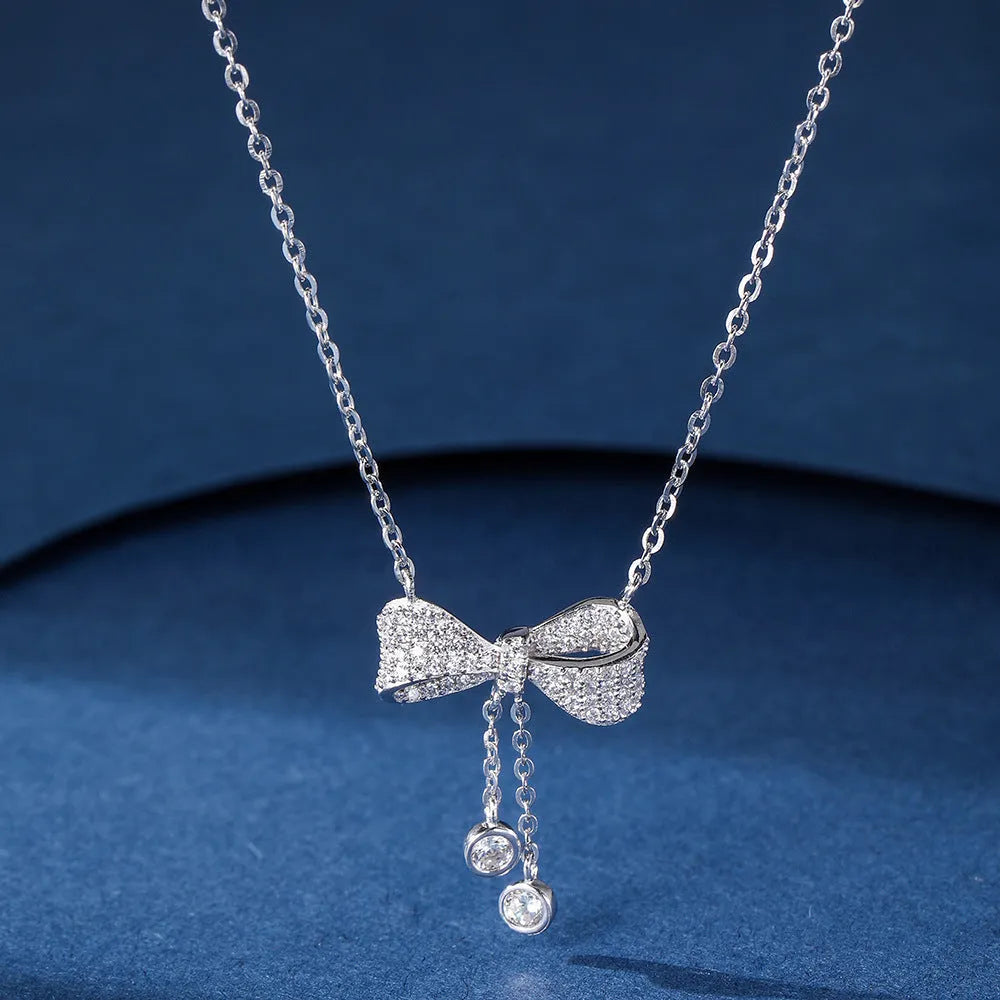 S925 sterling silver necklace with bow pendant on O-ring chain