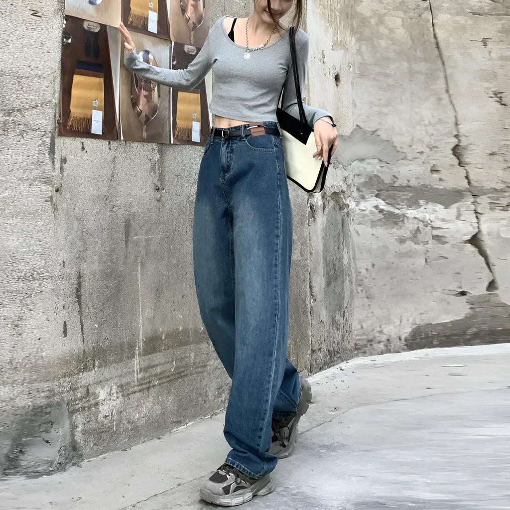Women's high-waisted retro blue straight-leg jeans in 100% cotton denim laid flat.