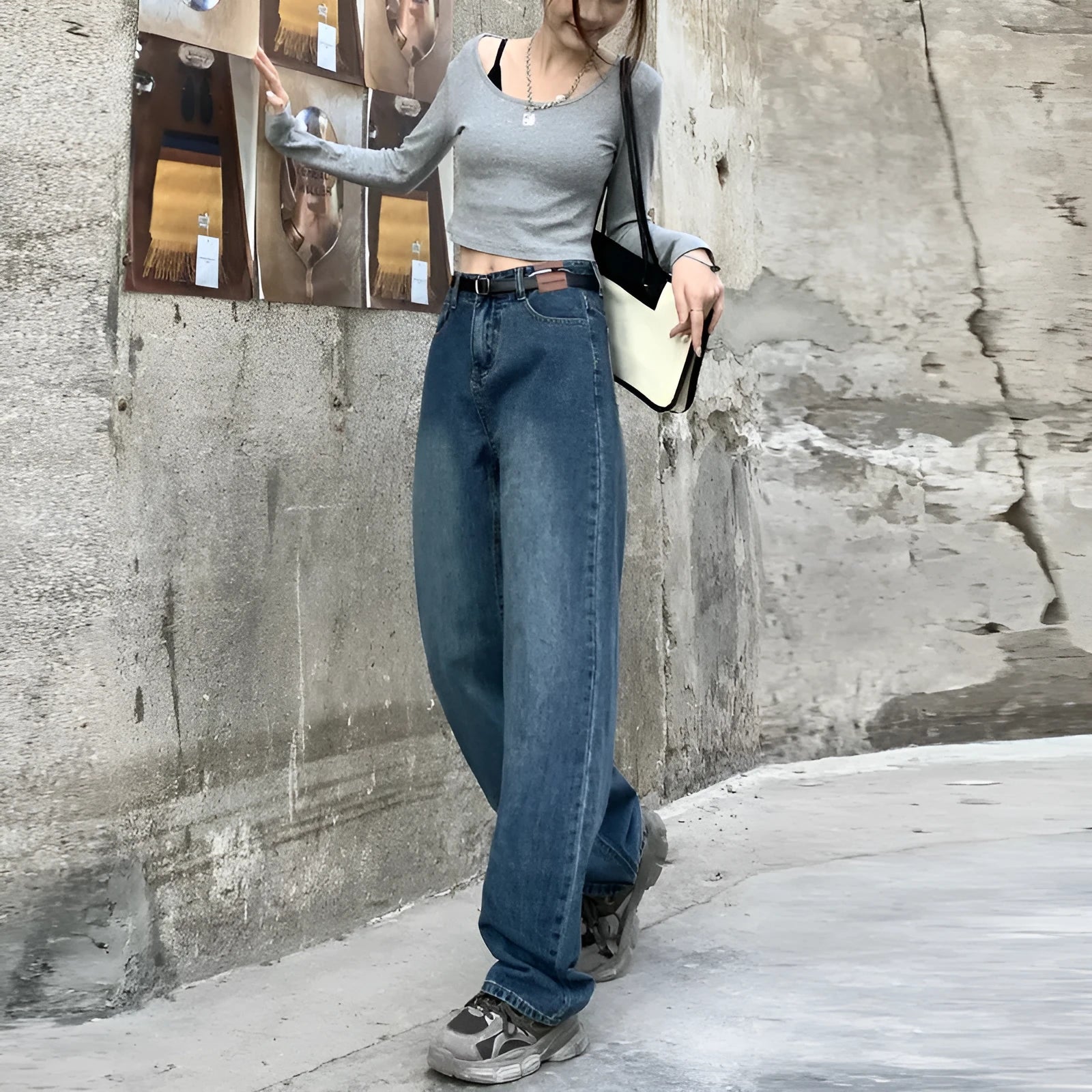 Women's high-waisted retro blue straight-leg jeans in 100% cotton denim laid flat.