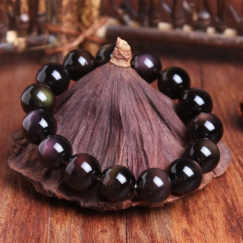 Unisex polished crystal Pi Xiu bracelet in ethnic geometric design with ice stone beads.