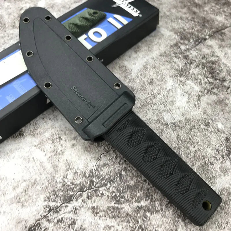 Mini straight knife with 440C steel blade, ABS handle, and holster on outdoor surface