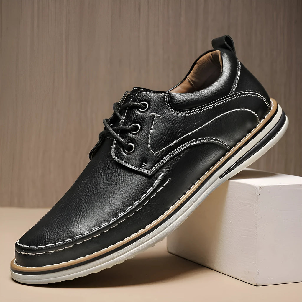Men's genuine leather casual shoes in black with round toe and lace-up design on rubber sole