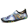 Blue leak-proof beach wading shoes with Lycra upper for men and women on a sandy background