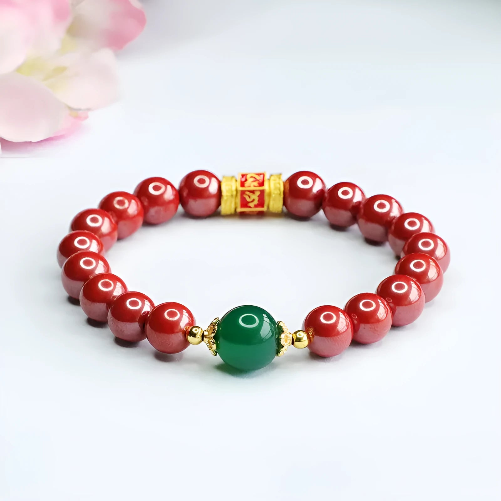 Cinnabar bracelet with engraved six-word motto and 8mm beads in emperor sandstone colour