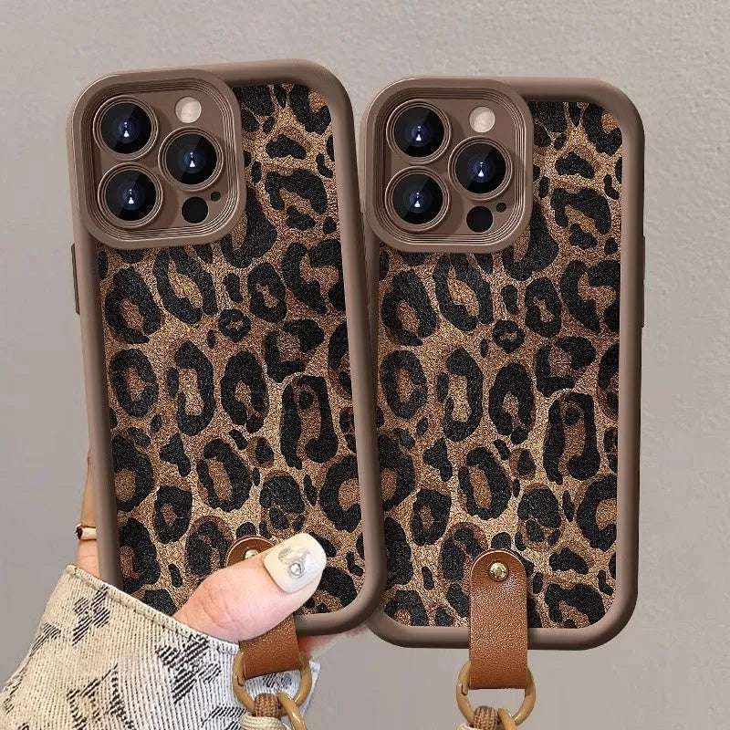 Brown leopard print silicone lanyard case for iPhone with hands-free strap.