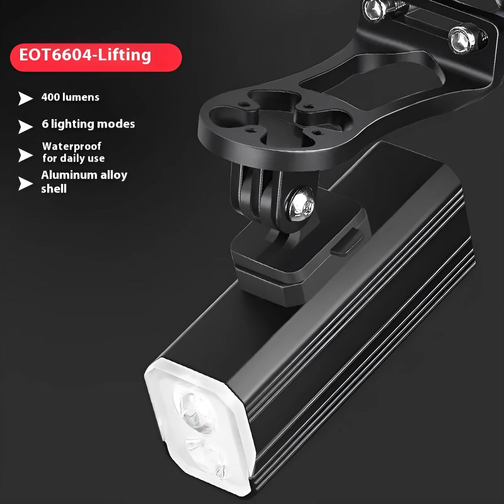 Aluminium alloy mountain bike headlight with silicone mounting bracket, showing scale and TPYE-C charging port.