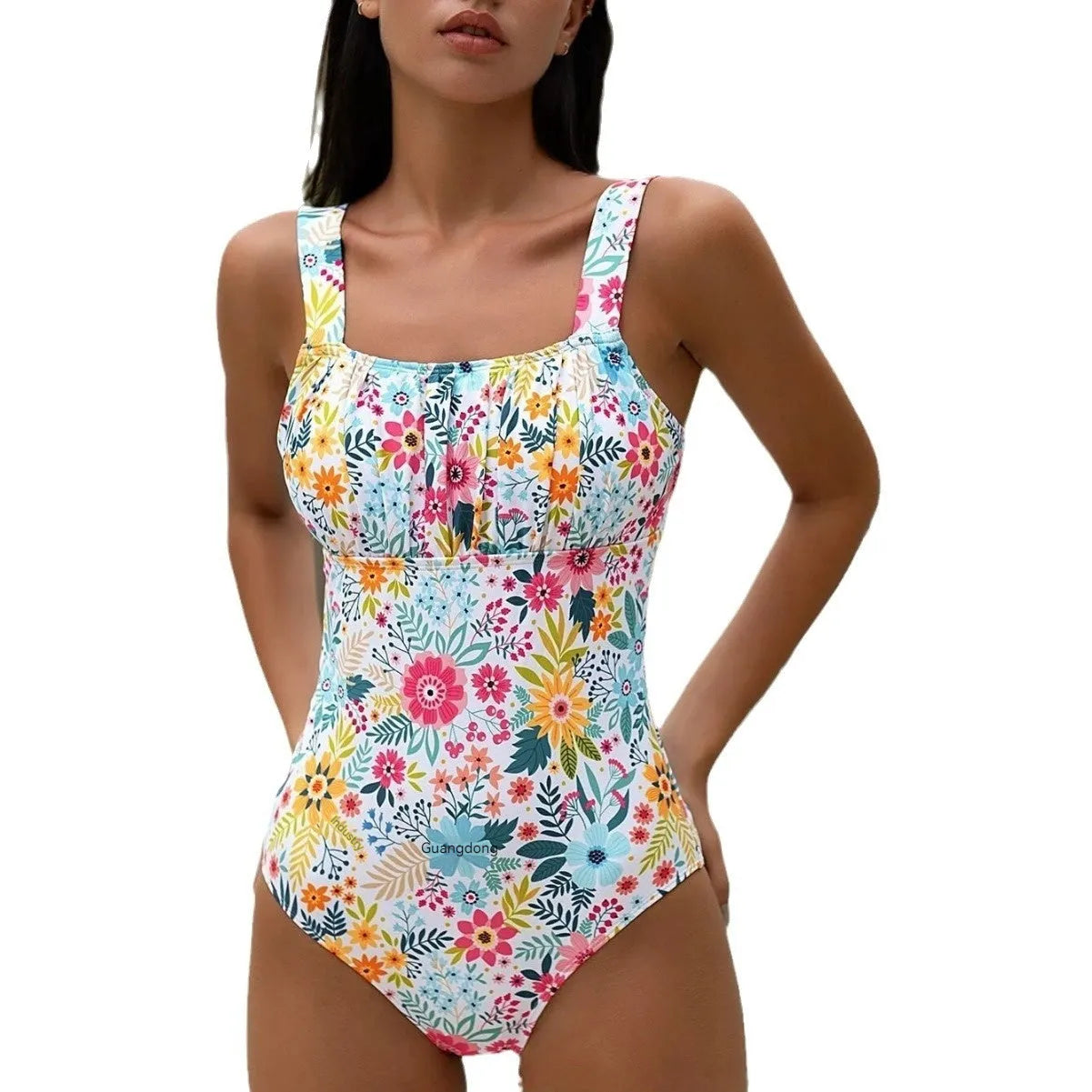 Women's pastoral floral print one-piece swimsuit shown in available colours with full-bed design