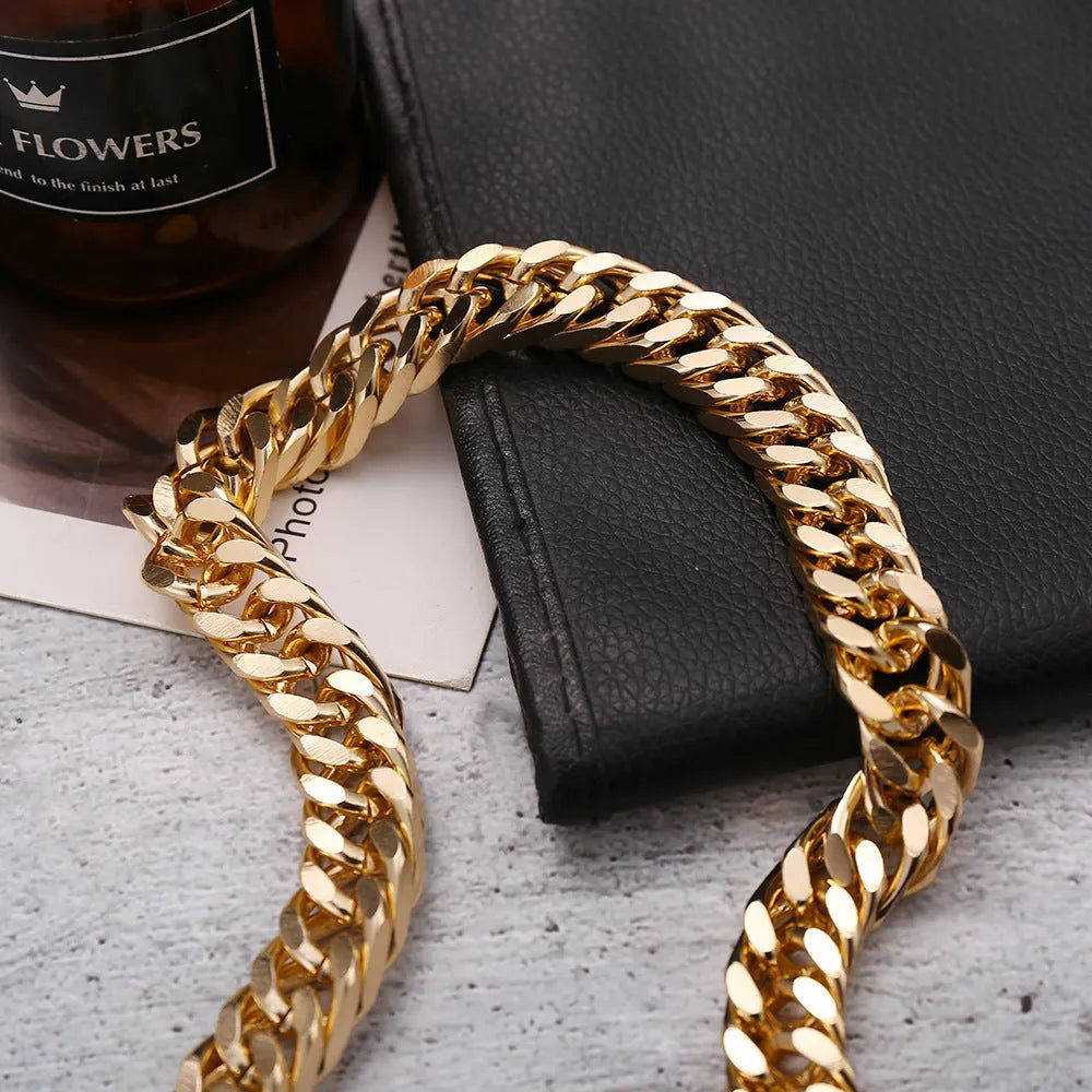 Gold tone women's necklace with thick 6cm chain links on a 32cm alloy chain, electroplated finish.