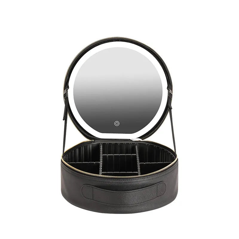 Round black smart LED makeup bag with lighted mirror open, showing internal partitions.