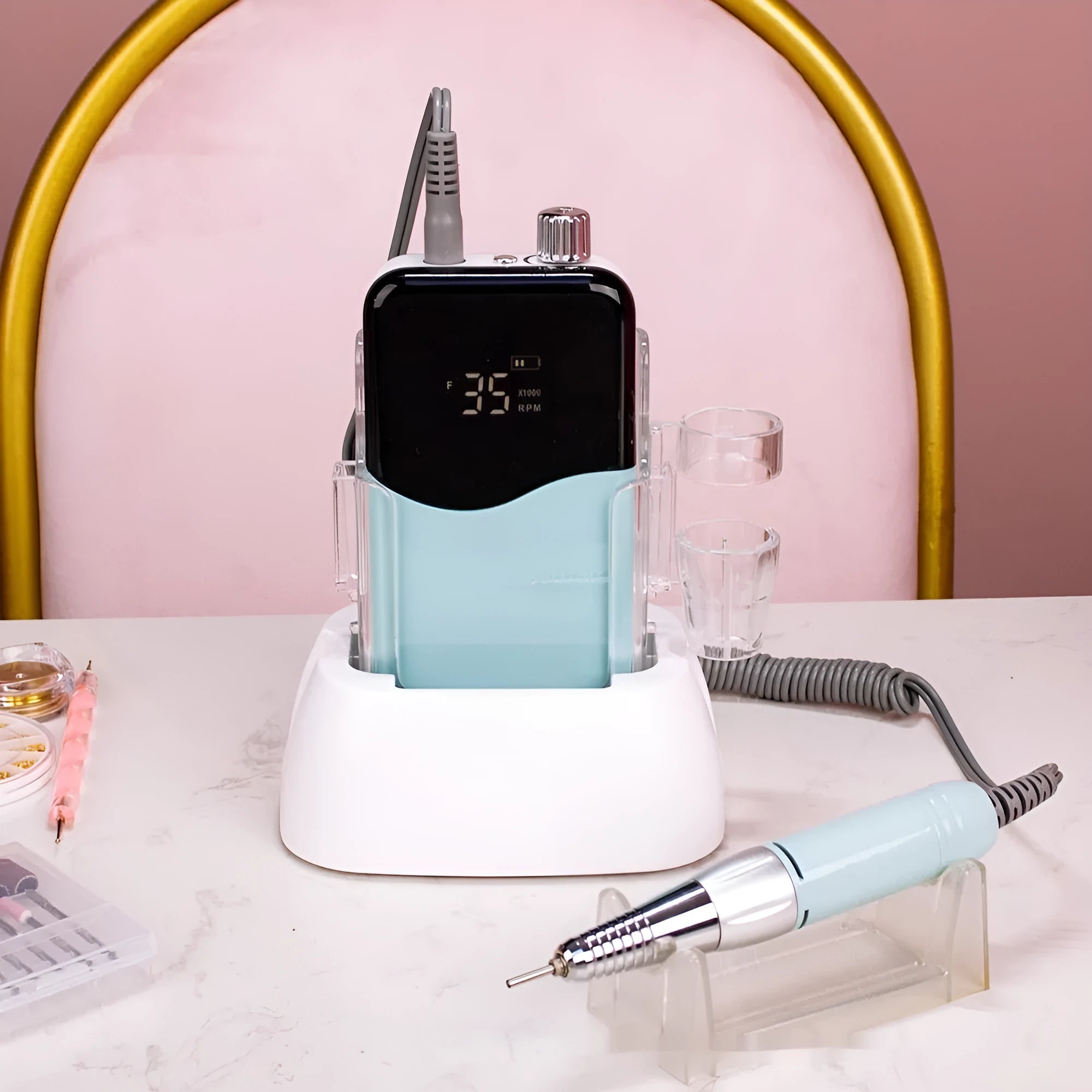 Ail Beauty electric nail grinder with power storage in white plastic body, side view
