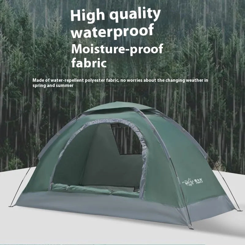 Single person portable camping tent in green, shown unfolded with fibreglass pole.