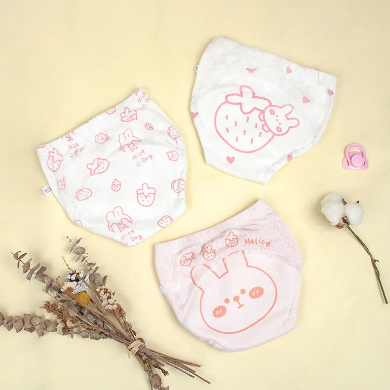 Washable pure cotton cloth diaper training pant with waterproof layer in bear and strawberry rabbit designs, sizes 90-110.