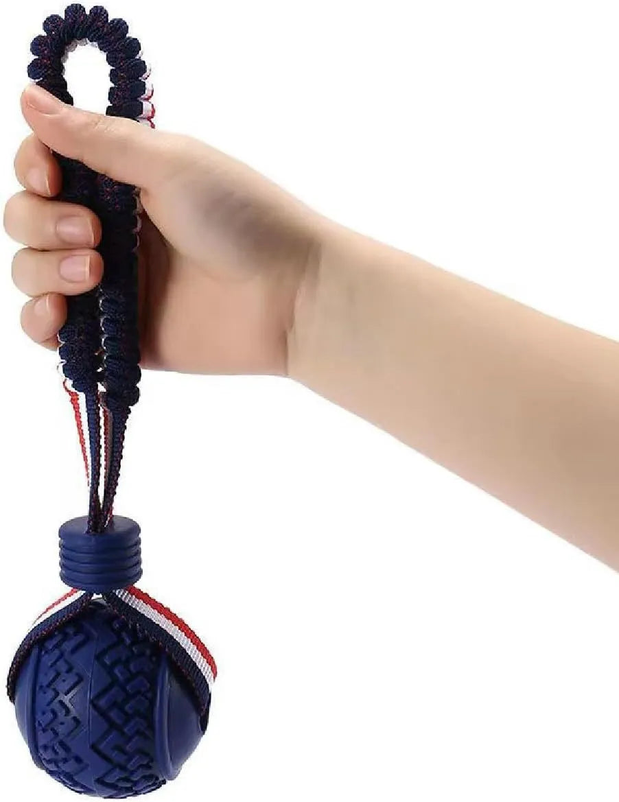Blue natural rubber dog ball with rope toy, textured surface, shown with measurements