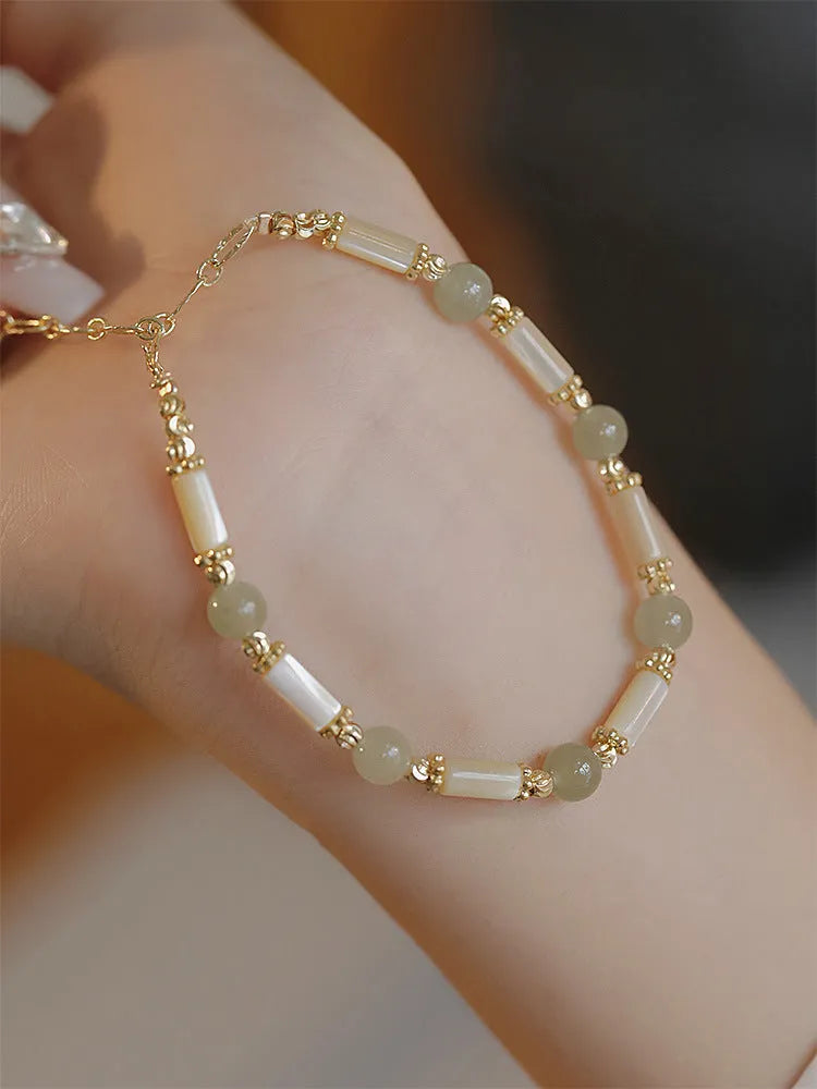 Hetian jade women's bracelet with bamboo joint design in jade or South Red colour, 6mm wide.