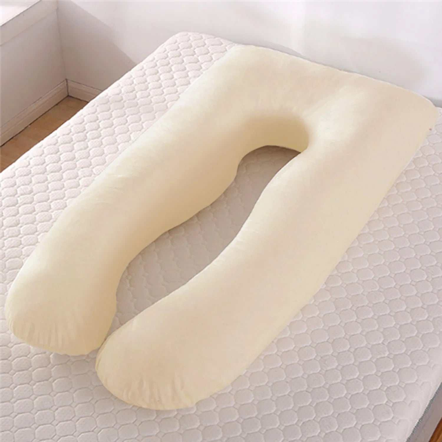 U-shaped pregnancy pillow in ice silk fabric shown in light blue colour, demonstrating its supportive shape.