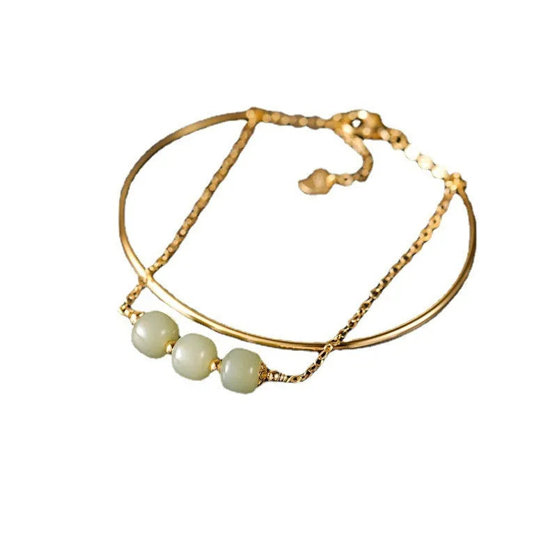 Hetian jade lucky beads bracelet with gold inlay treatment in single, double, or three beads version