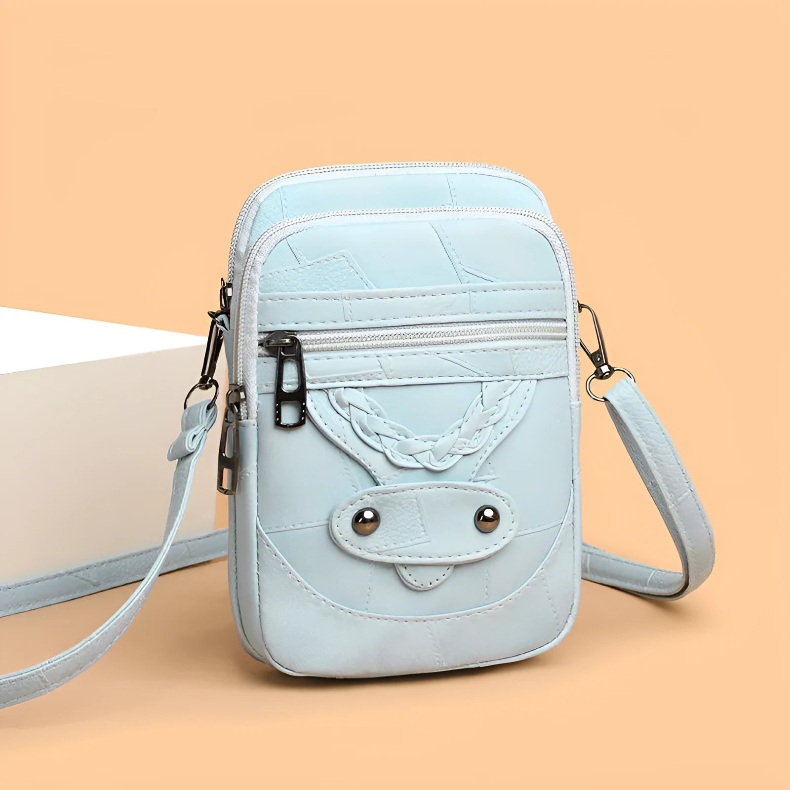Soft leather retro mobile phone bag showing square vertical design with weaving patterns and decorative rivets