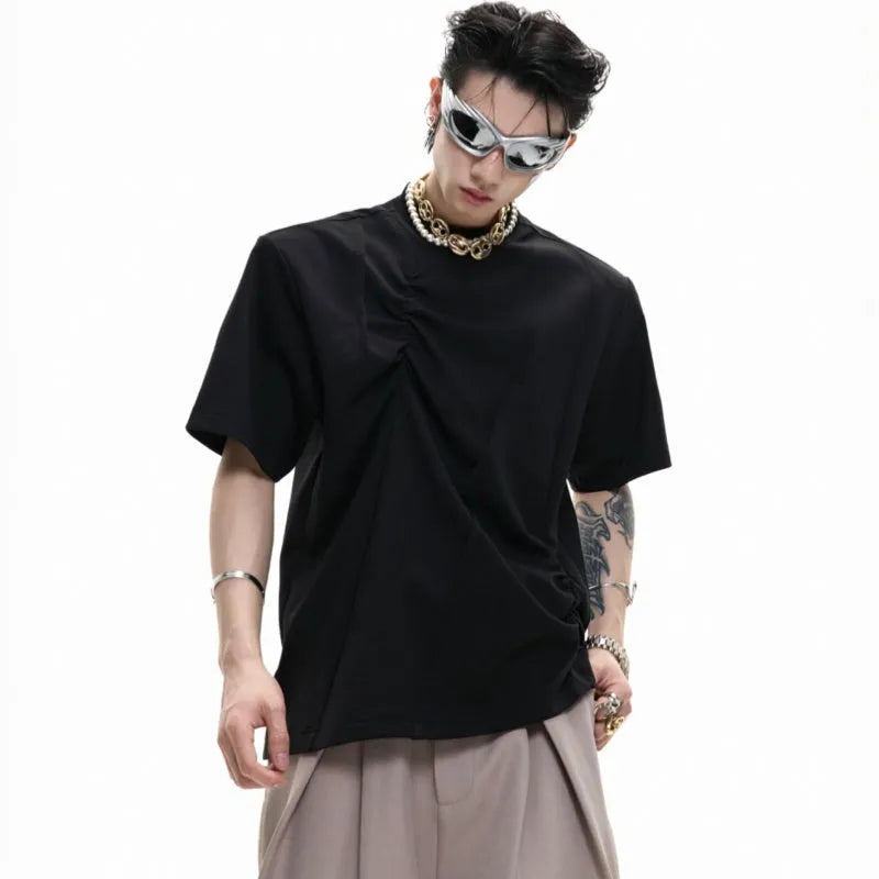 Men's loose fit cotton T-shirt in black with 3D pleated detail and round neck.