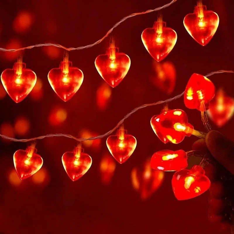 Love Lamp LED string lights with red plastic lamps, battery operated, IP43 rated, 2800 lumens