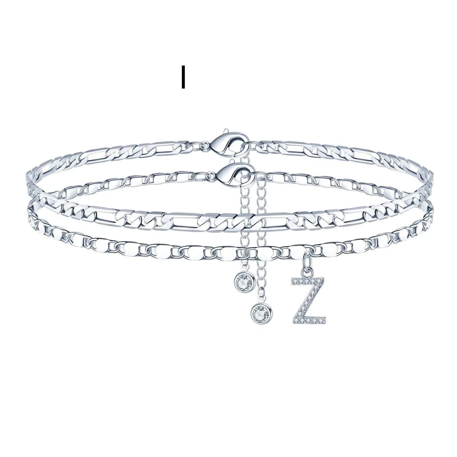 Silver-coloured double-circle bead copper anklet showing alphabet letter modelling on ankle.