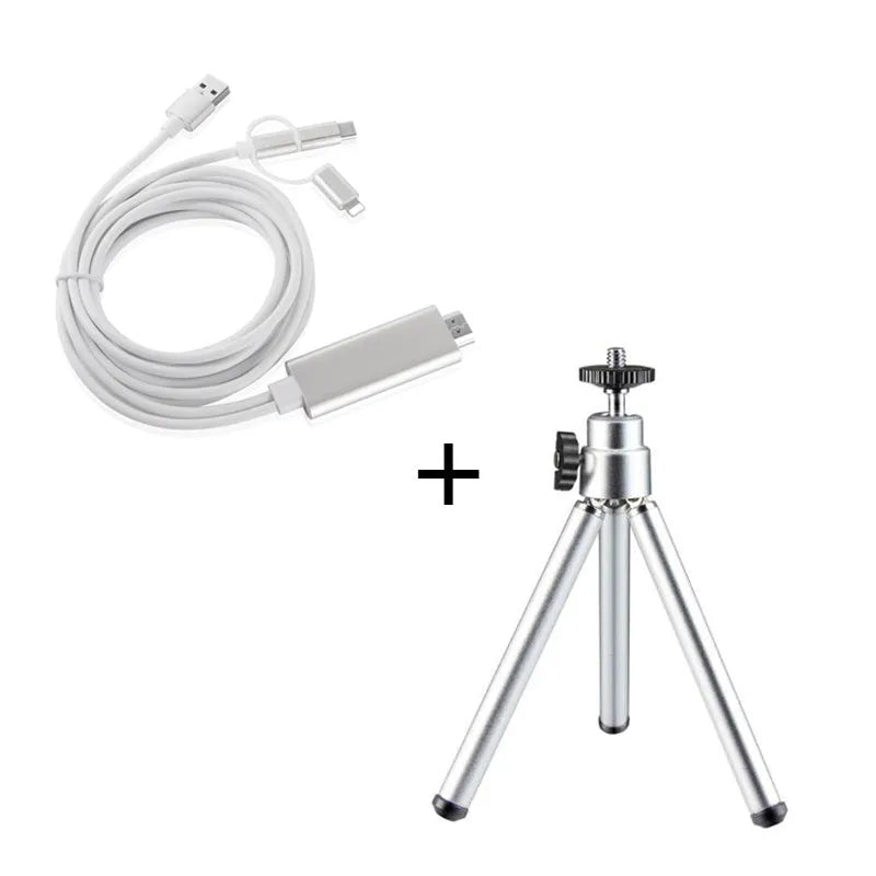 Mini aluminium tripod with extended legs and a black U-shaped phone clip attached