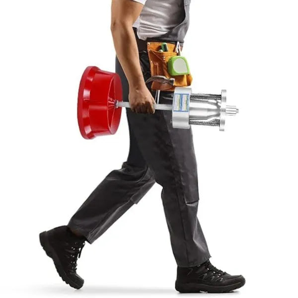 Portable wheel hub balancer with aluminium head and bull's eye level on an enamel base.