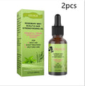 59ml bottle of Rosemary Mint Hair Growth Fluid for scalp massage and hair nourishment