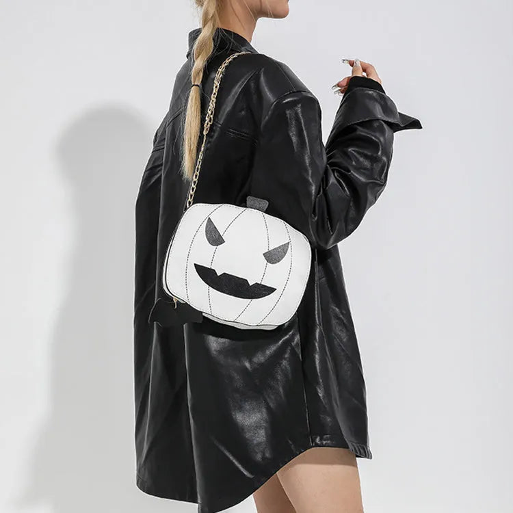 Halloween cartoon pumpkin shoulder bag for girls in colour options with chain crossbody strap on white background