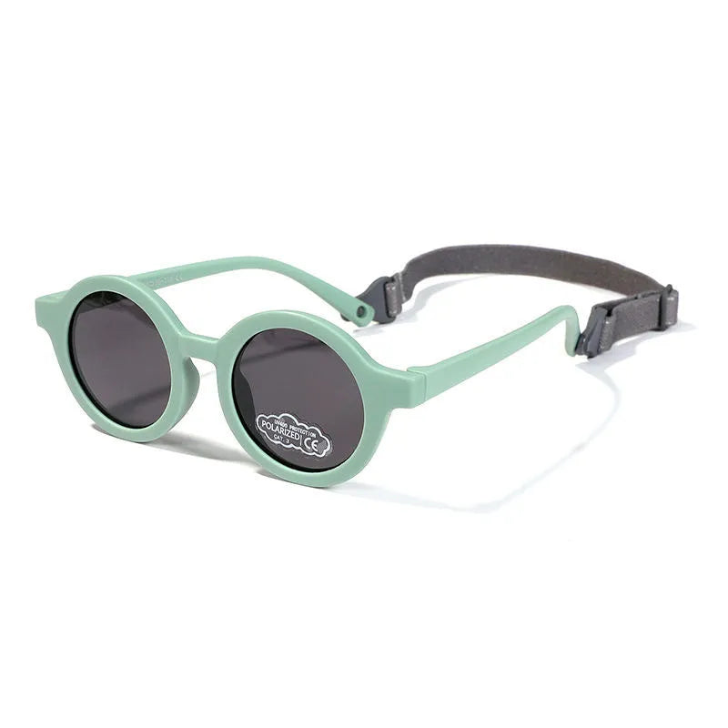 Children's silicone sunglasses for 0-3 year olds with round frame and polarized lenses in multiple colour options